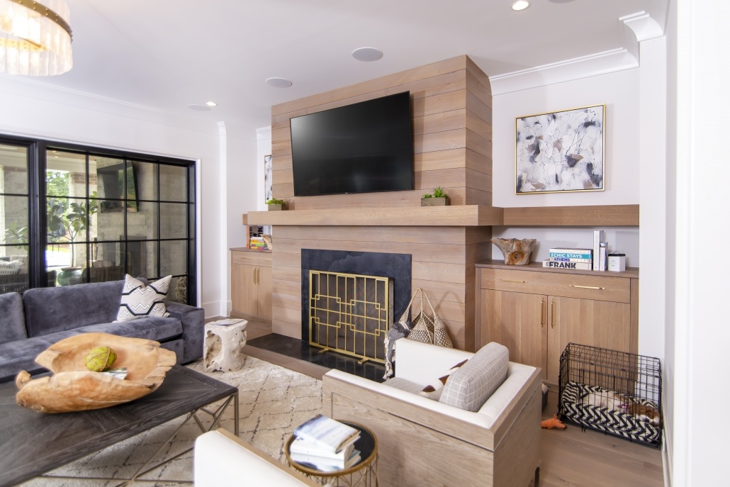 white oak fireplace mantle and accent wall in living room