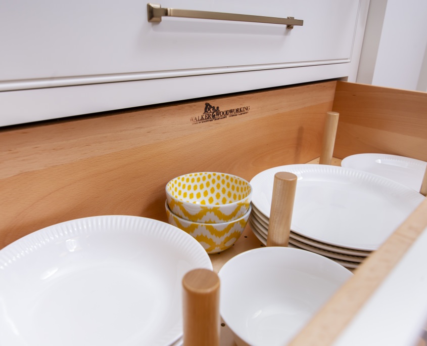 dish drawer with pegs in white kitchen